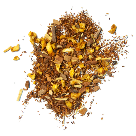 A close-up image of Apple Cider Rooibos tea leaves, showcasing the blend of rooibos tea base with pieces of apple and cinnamon.