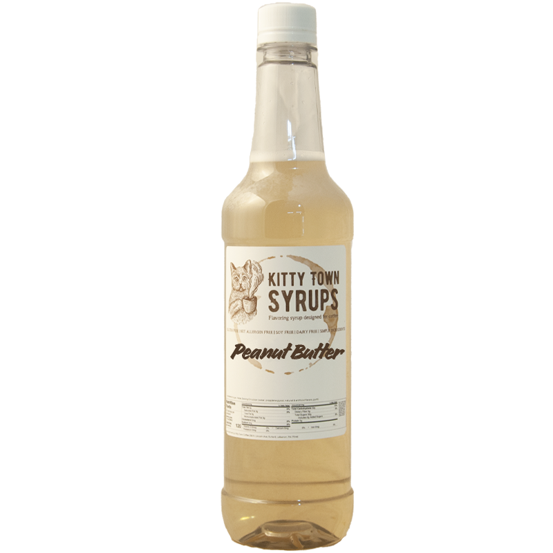 A plastic bottle of Peanut Butter flavoring syrup from Kitty Town Syrups, with a white label and cap.