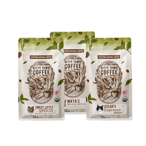 Three bags of organic coffee: Sweet Little Spoon, Maya's Morning Melody, and Oscar's Espresso Encore