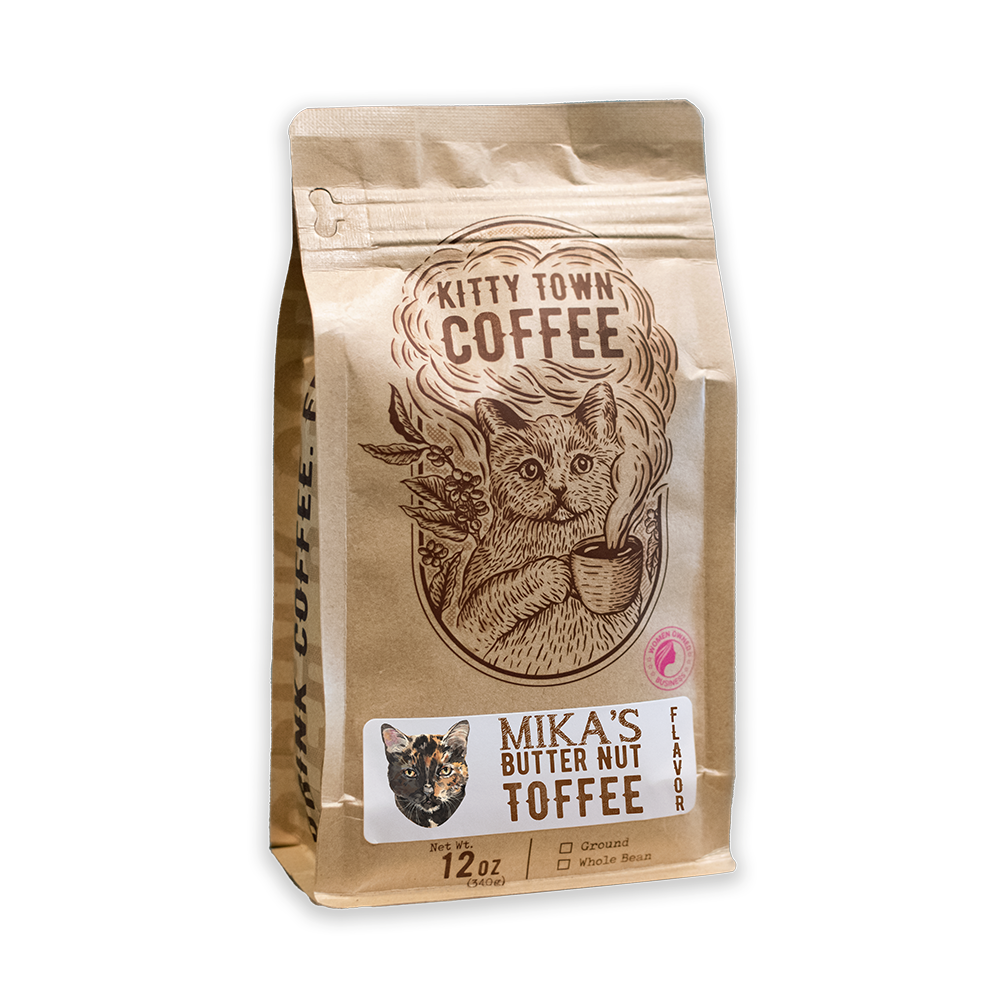 A package of Kitty Town Coffee's Mika's Butter Nut Toffee flavored coffee, featuring an illustration of a cat on the bag.