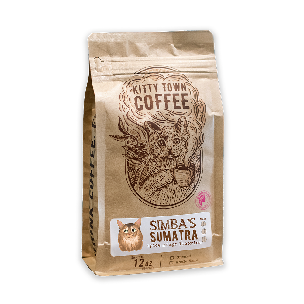 A packaged bag of Simba's Sumatra dark roast coffee from Kitty Town Coffee with an illustration of a cat on the front.