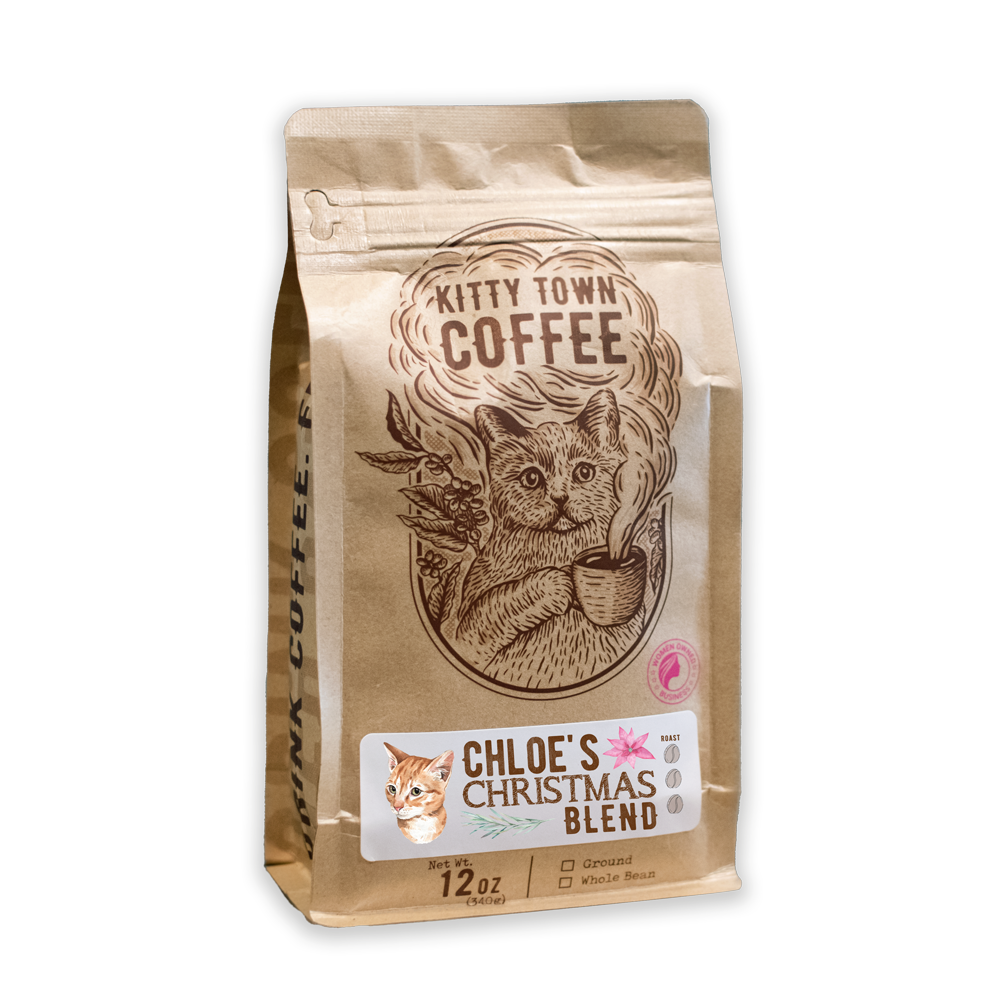 A packaged coffee blend named 'Chloe's Christmas Blend' from Kitty Town Coffee, featuring an illustration of a cat on the bag.