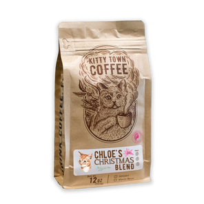 A packaged coffee blend named 'Chloe's Christmas Blend' from Kitty Town Coffee, featuring an illustration of a cat on the bag.