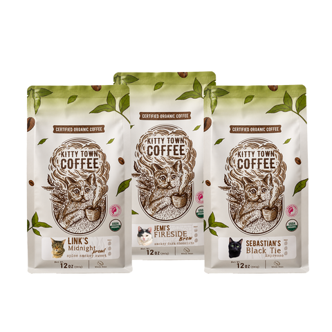 Three bags of organic dark roast coffee: Link's Midnight Prowl, Jemi's Fireside Brew, and Sebastian's Black Tie Espresso