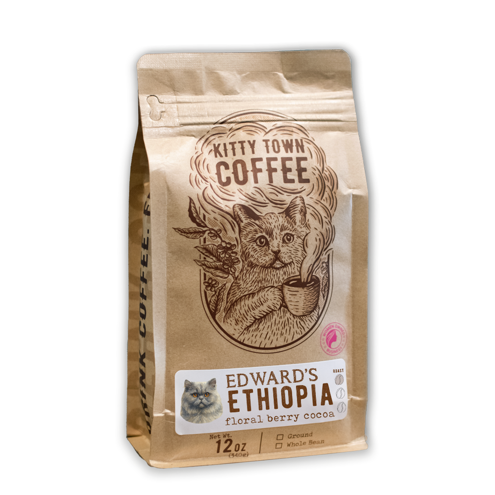 Kitty Town Coffee bag with a cat illustration on a white background