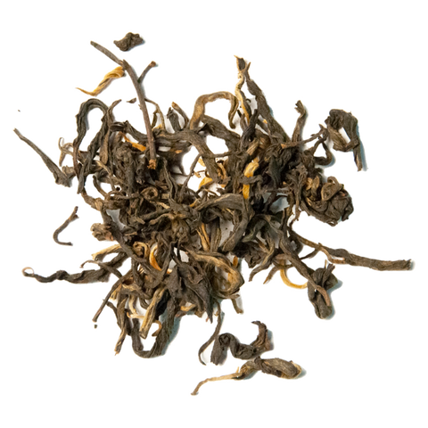A cluster of golden yunnan black tea leaves.