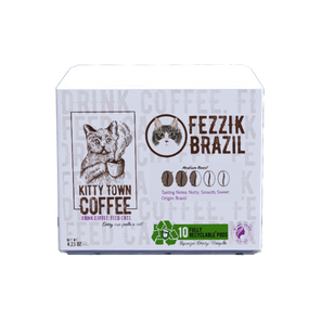 A box of Kitty Town Coffee Fezzik Brazil coffee pods, with an illustration of a cat on the front, and recycling symbols indicating the pods are recyclable.