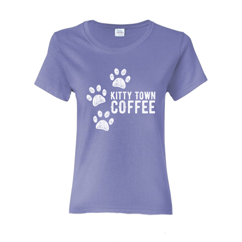 Purple t-shirt with white paw print design and 'Kitty Town Coffee' text on a white background