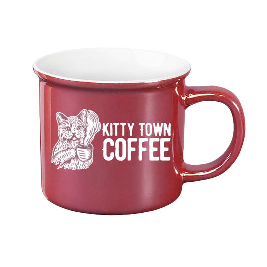 Red mug with 'Kitty Town Coffee' text and cat graphic on a white background