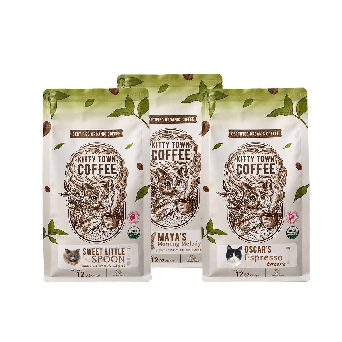 Three bags of organic coffee: Sweet Little Spoon, Maya's Morning Melody, and Oscar's Espresso Encore
