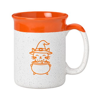 A ceramic mug with a speckled white exterior, a bright orange interior and handle, and an orange line-art illustration of a witch cat holding a cauldron on the front.