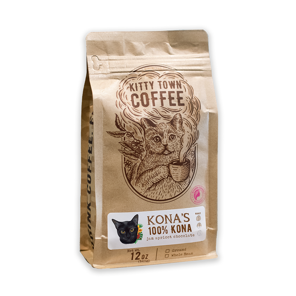 A packaged bag of Kona's Kona coffee with an illustration of a cat on the front.