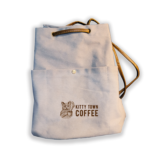https://www.kittytowncoffee.com/cdn/shop/products/SlingBackPack_533x.png?v=1672114115